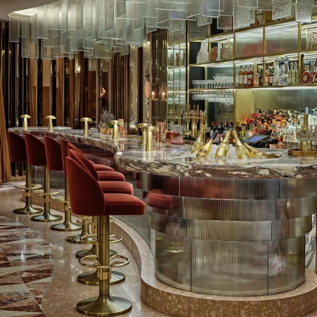 join us at Revery Bar, nestled within the Glitz and Glamour of The Hilton on Park Lane, Revery Bar, the newest addition to the hotel, underwent a lavish renovation at the end of 2023 and has since become the talk of the town.
