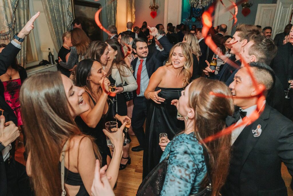 large group of guest dancing at a singles ball